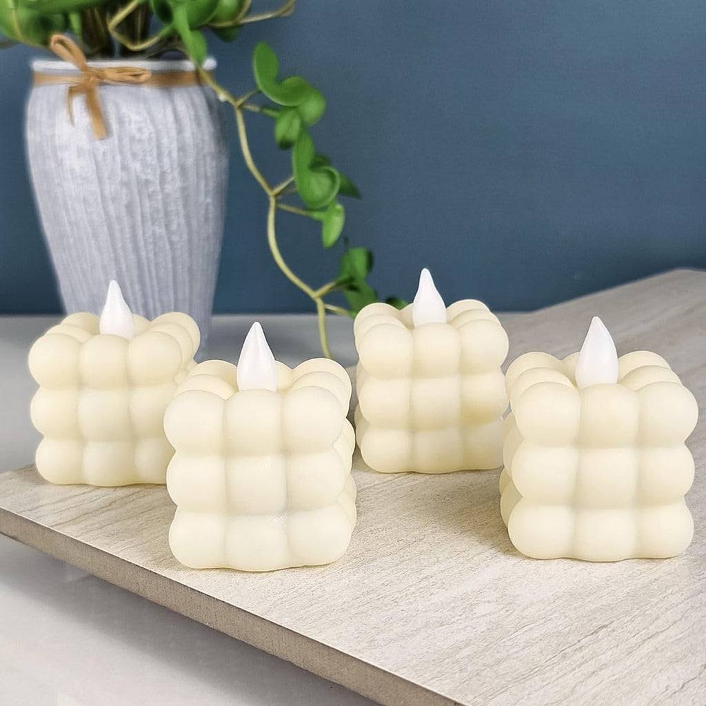 Group of battery operated LED decorative cube candles for home and festive use