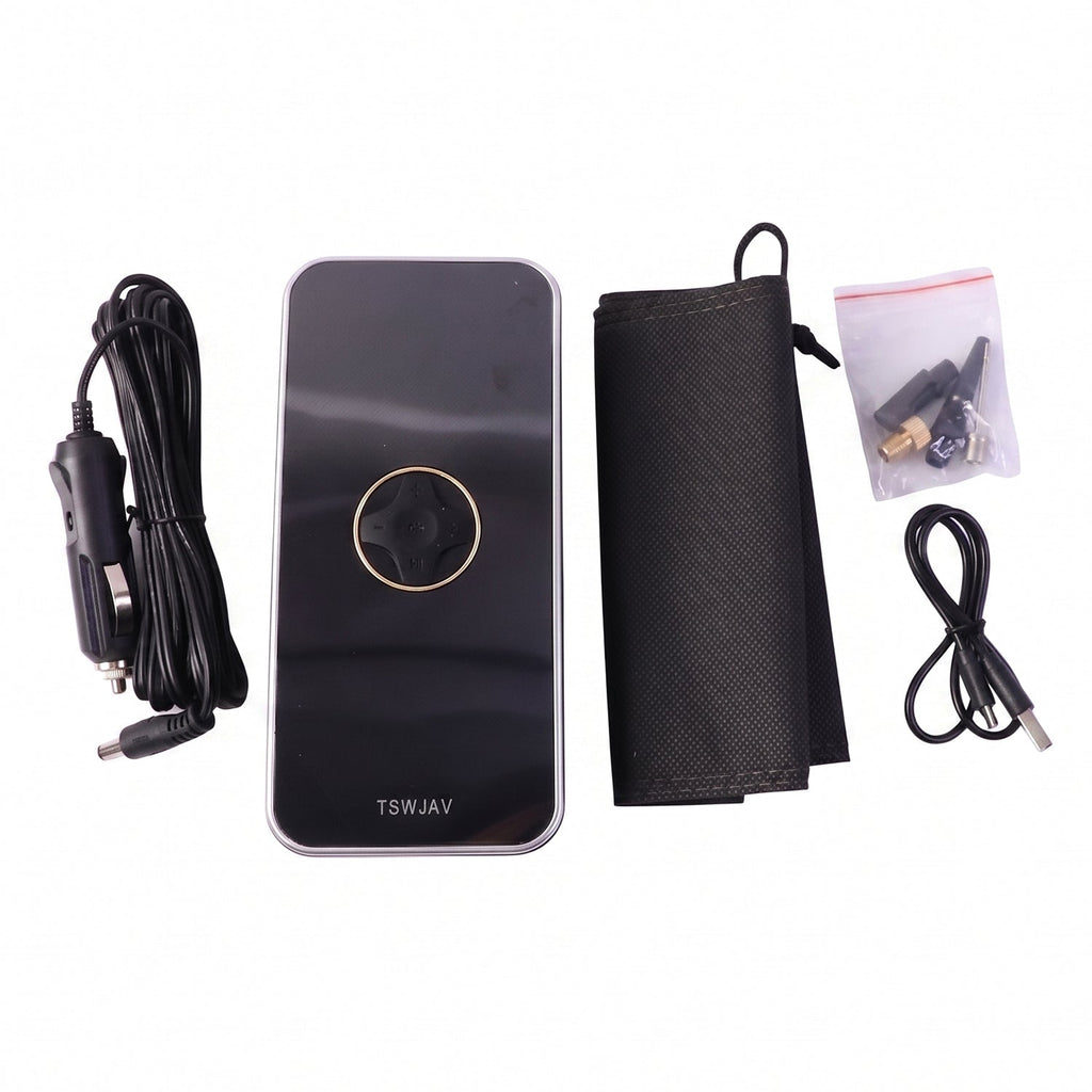 Black portable air pump on white background with accessories