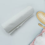 Kitchen tissue roll sheet effectively wiping a kitchen countertop and sink clean.