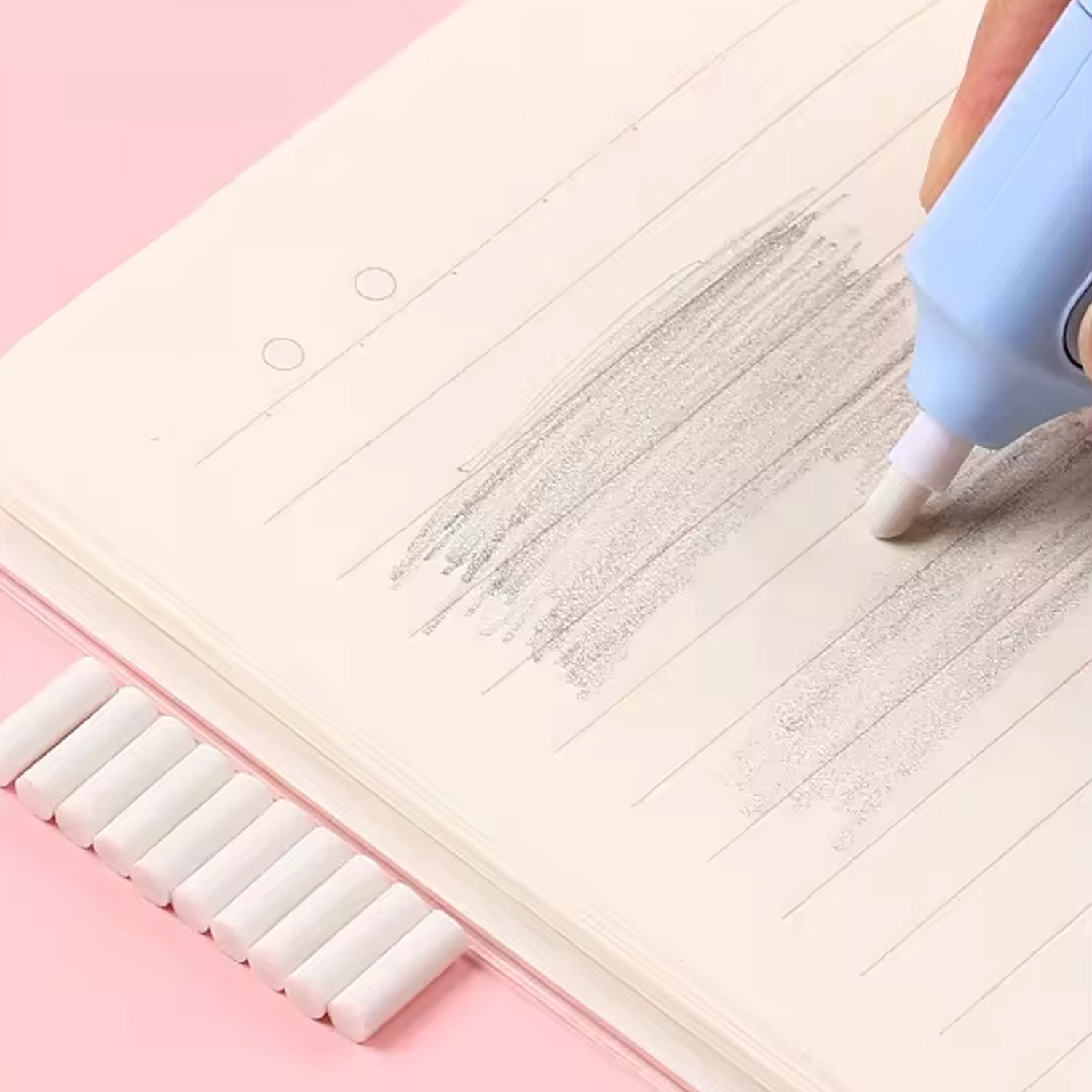 ScribbleJoy Electric Eraser Kit with spare refills and product packaging.