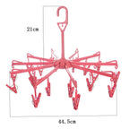 Drying rack with blue clips for underwear and bras, designed for optimal airflow.