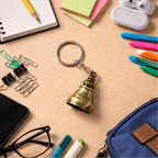 Temple bell keychain attached to a key ring showing durable construction