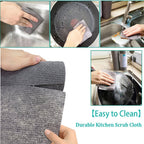 Microfiber dish cloth being rinsed under running water for easy cleaning.