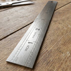 Detailed steel ruler edge for accurate scale measurements