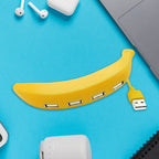Wiregenix Banana Shape USB Hub in use with a laptop, expanding available ports easily.