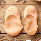 Pair of heel protector socks helping repair dry, cracked skin
