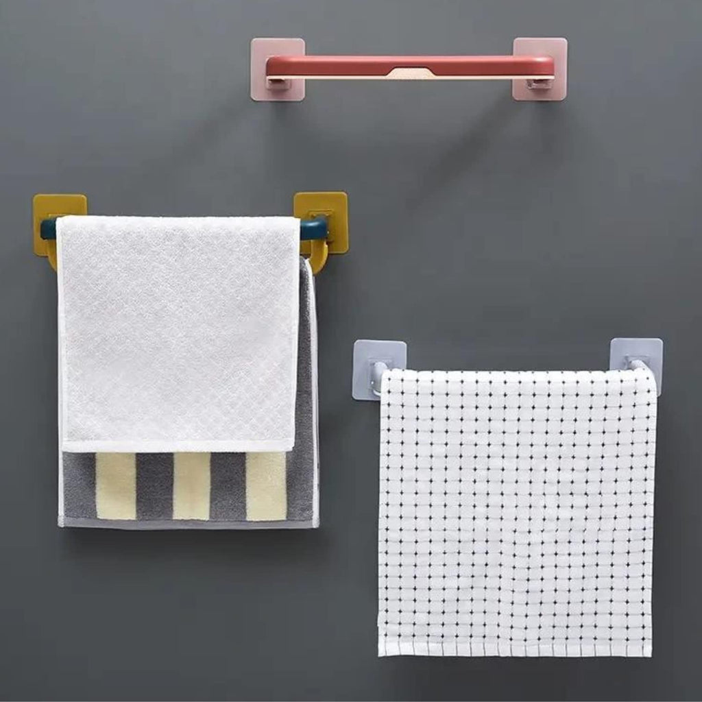Multifunctional folding towel shelf used in a kitchen for dishcloths and utensils.