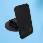 Top-down view of the rotating mobile stand in use, showcasing its 360-degree swivel feature with a phone.