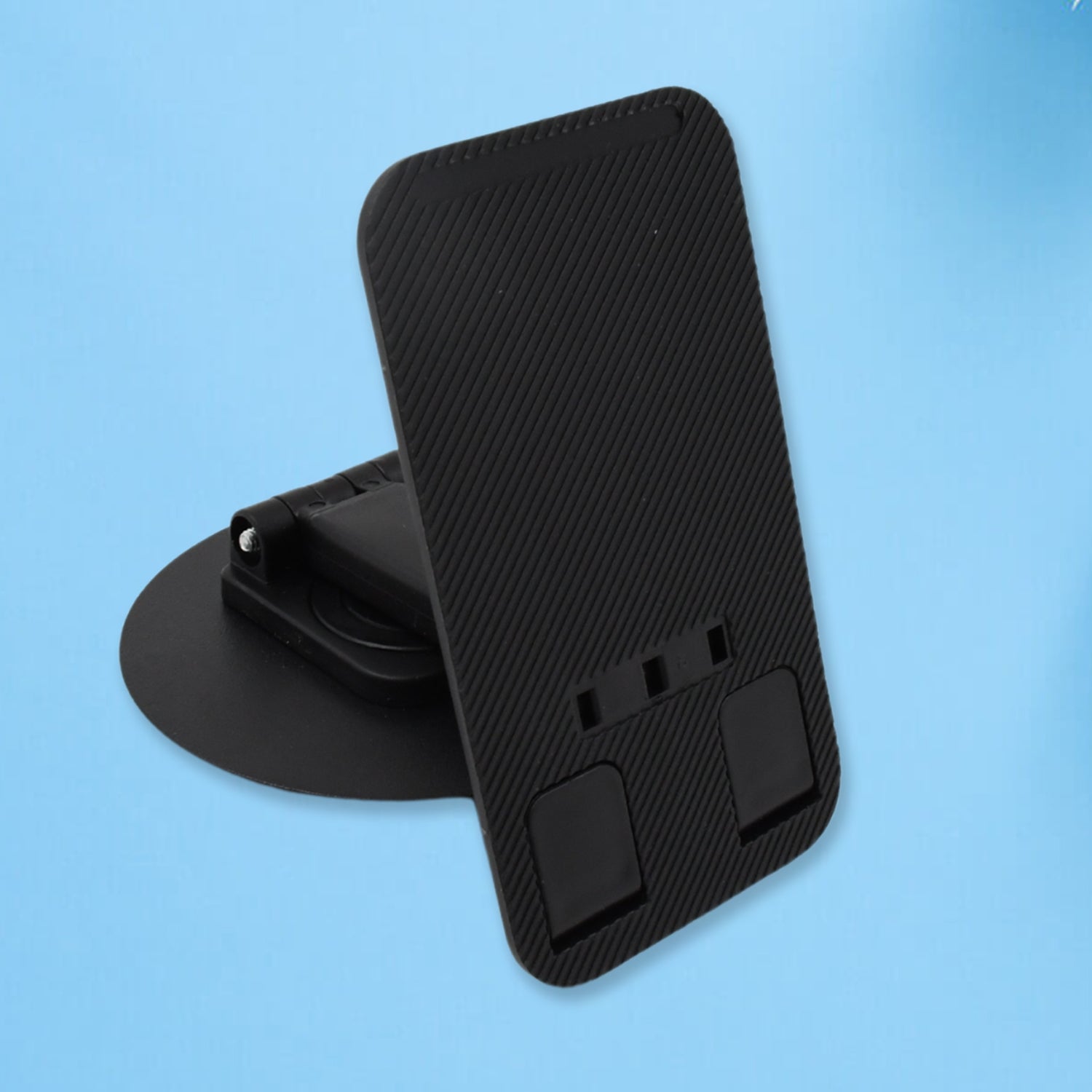 Top-down view of the rotating mobile stand in use, showcasing its 360-degree swivel feature with a phone.