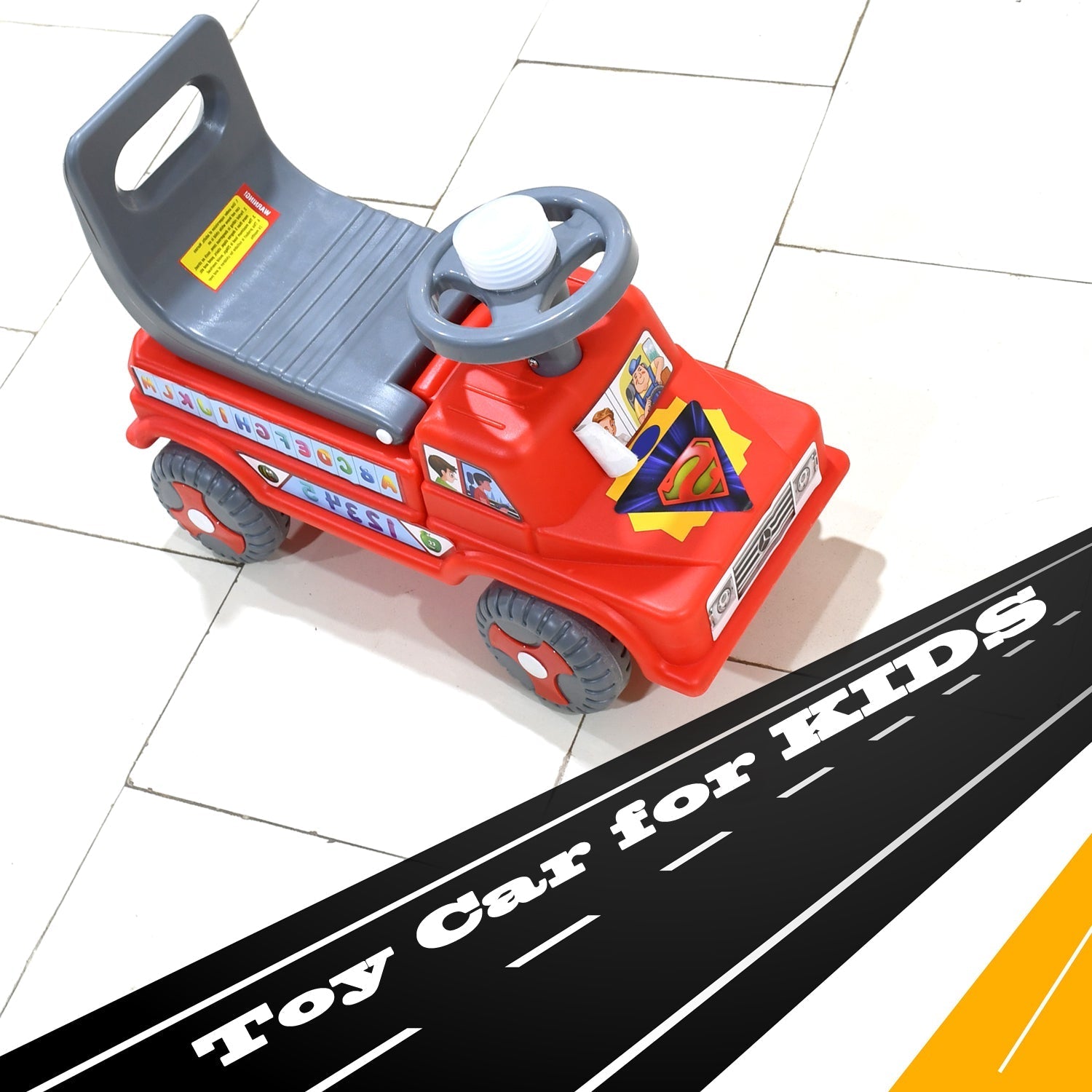 Close-up of the musical horn and steering wheel on the toddler car toy.