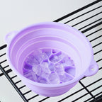 Folded compact silicone facial ice bath bowl ready for storage