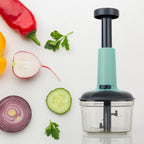 Quickslice Manual Food Chopper, a versatile kitchen tool for chopping, with its 3 stainless steel blades.