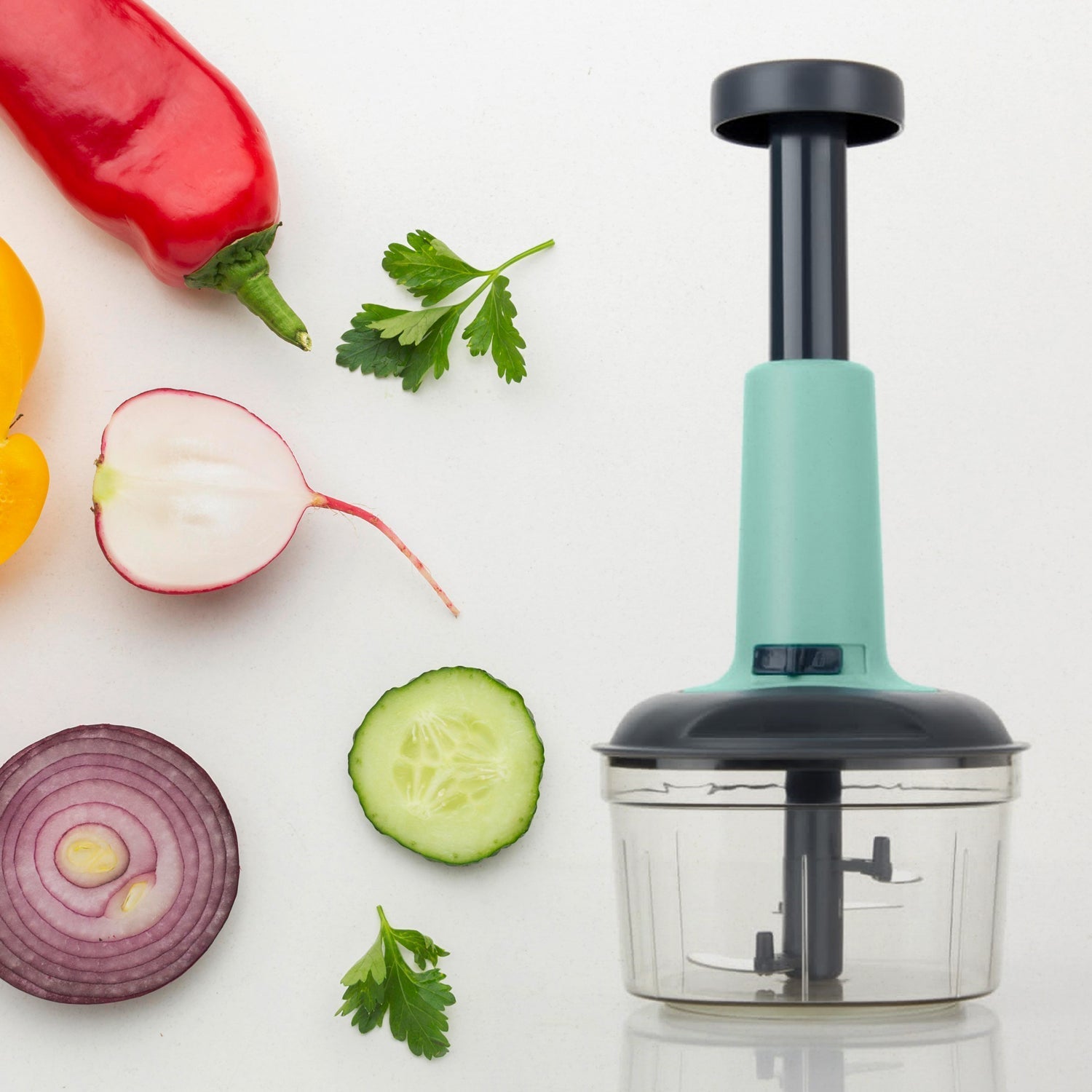Quickslice Manual Food Chopper, a versatile kitchen tool for chopping, with its 3 stainless steel blades.