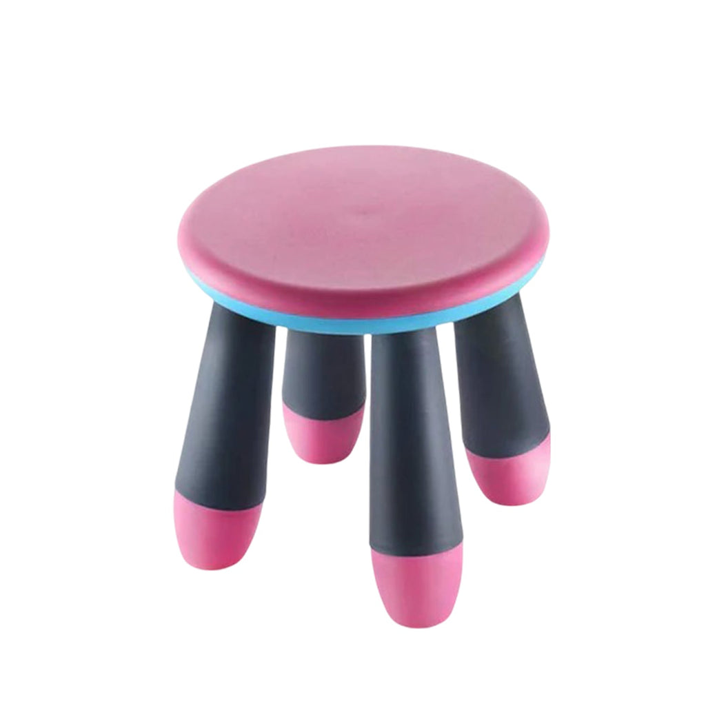 Toddler standing confidently on a sturdy foldable baby stool.