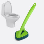 Long handle scrubber effectively tackling tough stains on a tiled surface.