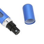 Gold-toned 5ml mini spray bottle, emphasizing its luxurious and portable design.