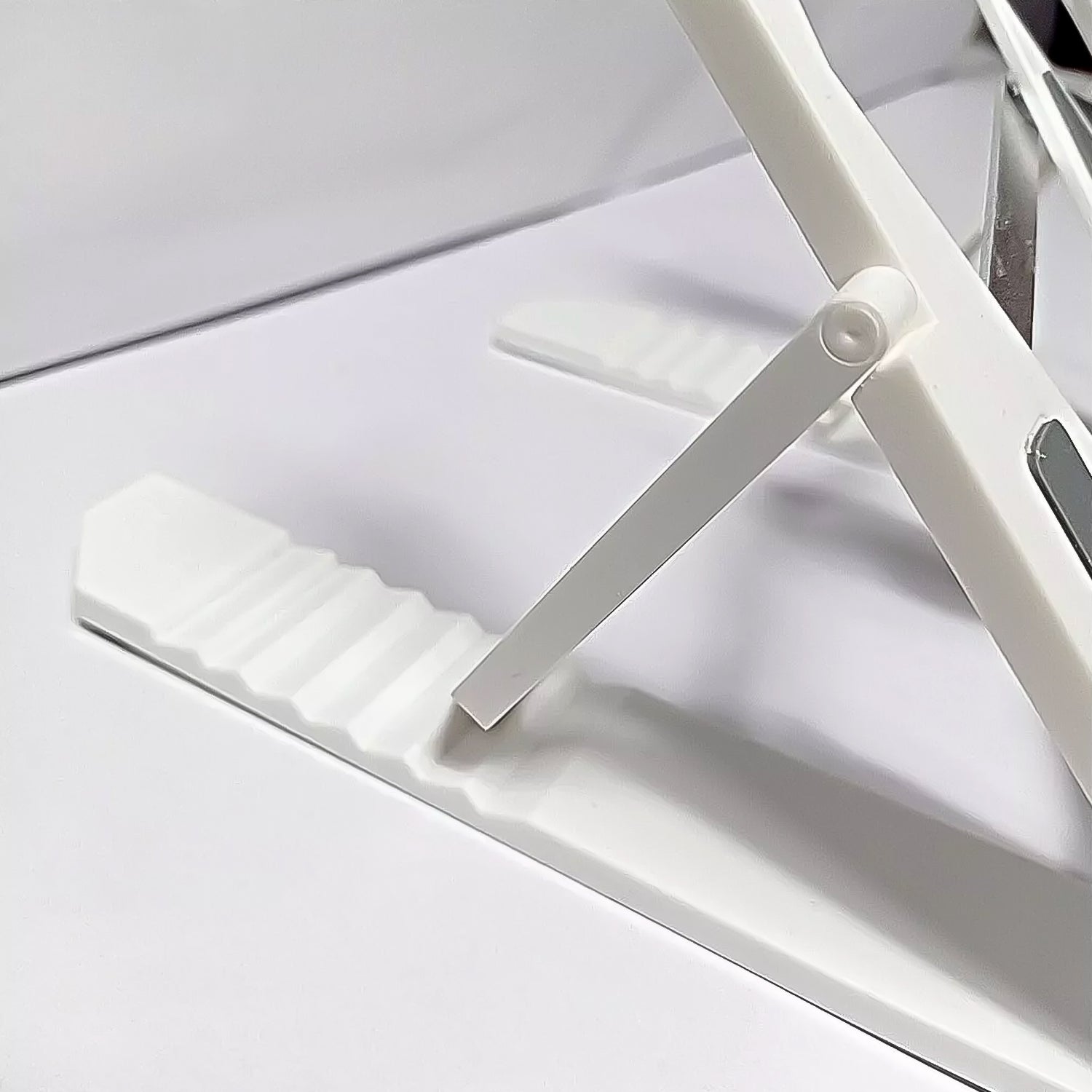 PHOBIA folding mobile and tablet stand in a compact, portable position.