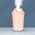 Cute bear USB humidifier with multicolor LED light glowing softly.