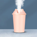 Cute bear USB humidifier with multicolor LED light glowing softly.