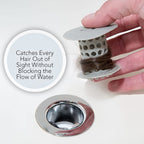 Hair trap filter for shower drain filled with caught hair