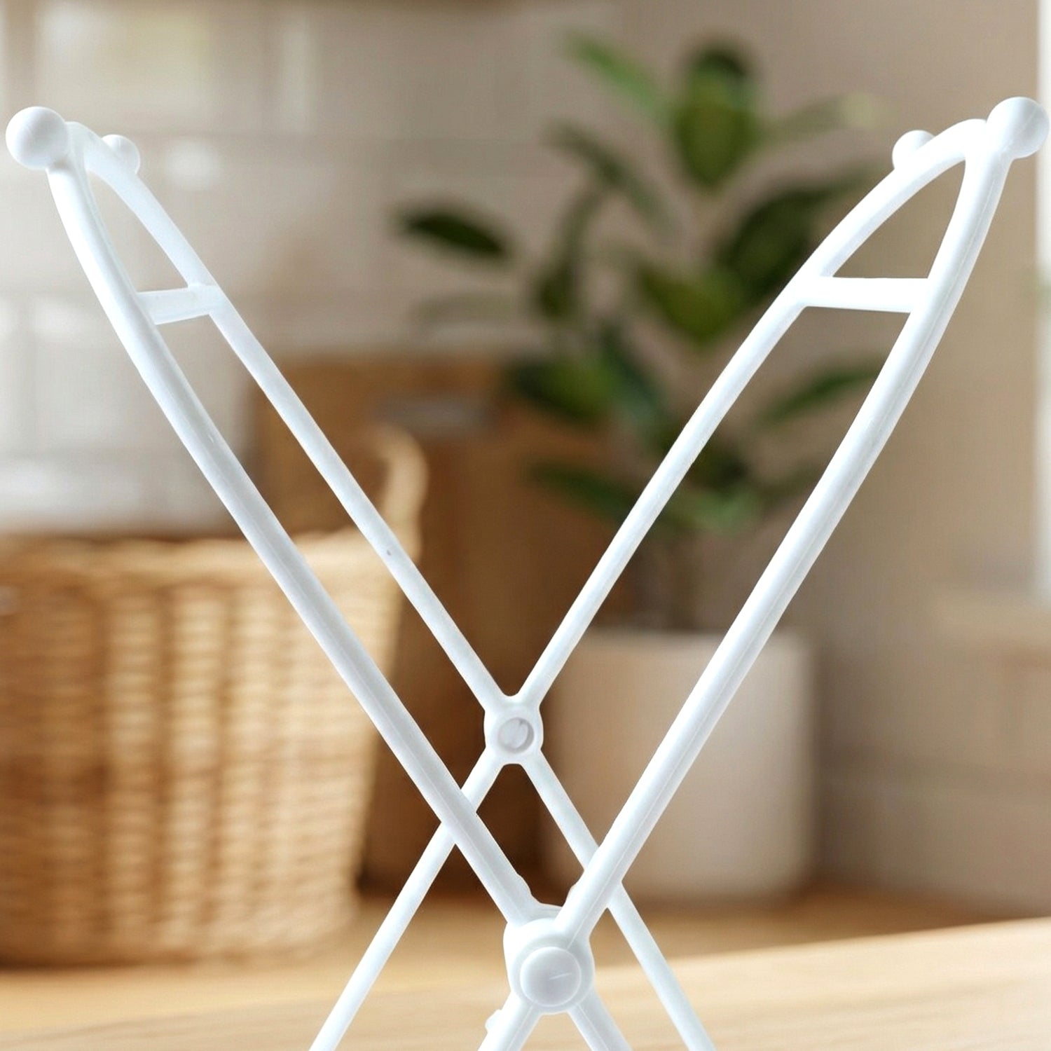 Folded garbage bag holder stand compact for convenient storage
