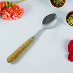 Elegant stainless steel dining spoon set with decorative handles for serving