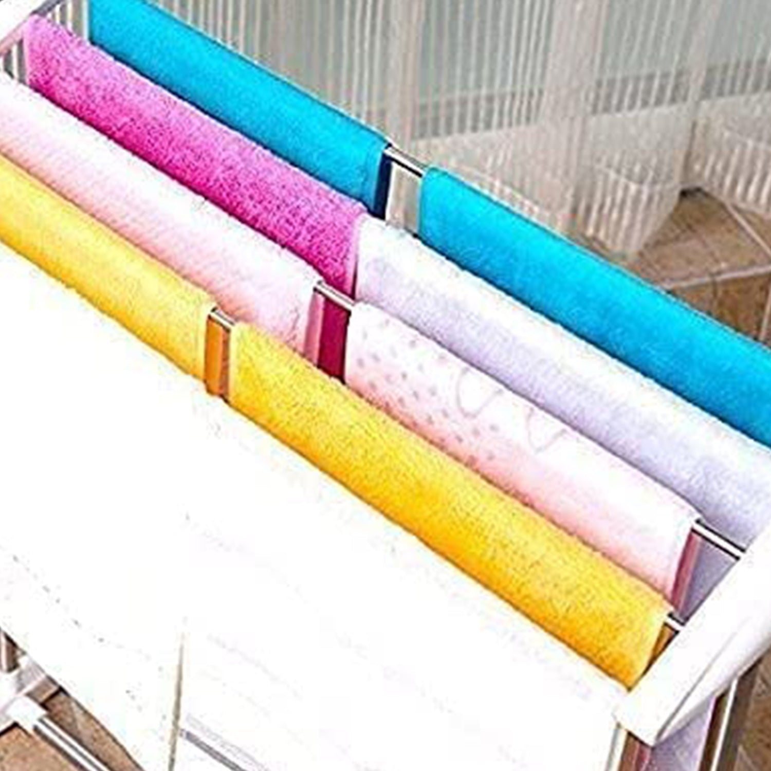 Versatile clothes dryer rack used for drying shoes and small garments.