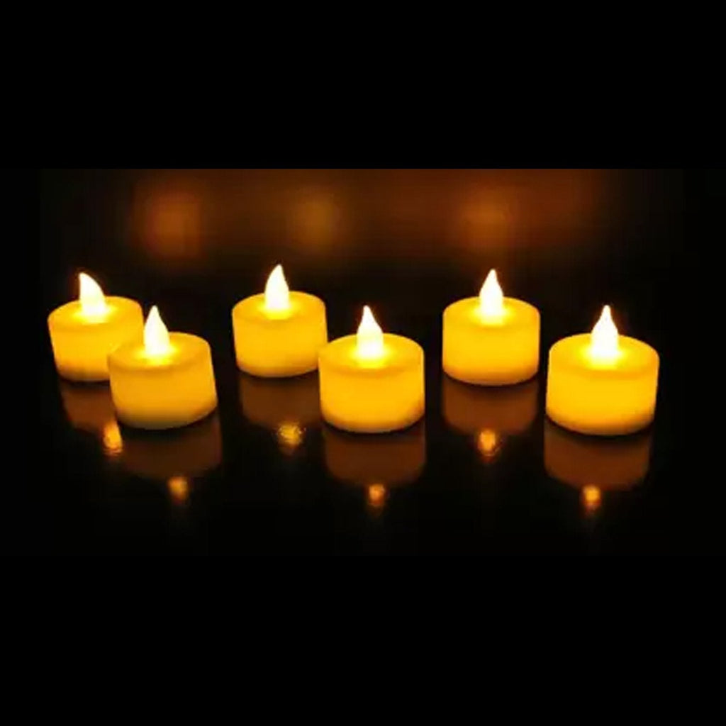 Group of white flameless LED tealight candles, perfect for creating ambiance.