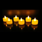 Group of white flameless LED tealight candles, perfect for creating ambiance.