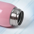 Side view of thermos kids water bottle highlighting compact 600ml size