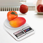 Digital kitchen food scale with a stainless steel platform for precise measurements.