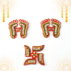 Assorted Laxmi Charan and Swastik decals in bright hues for Diwali décor