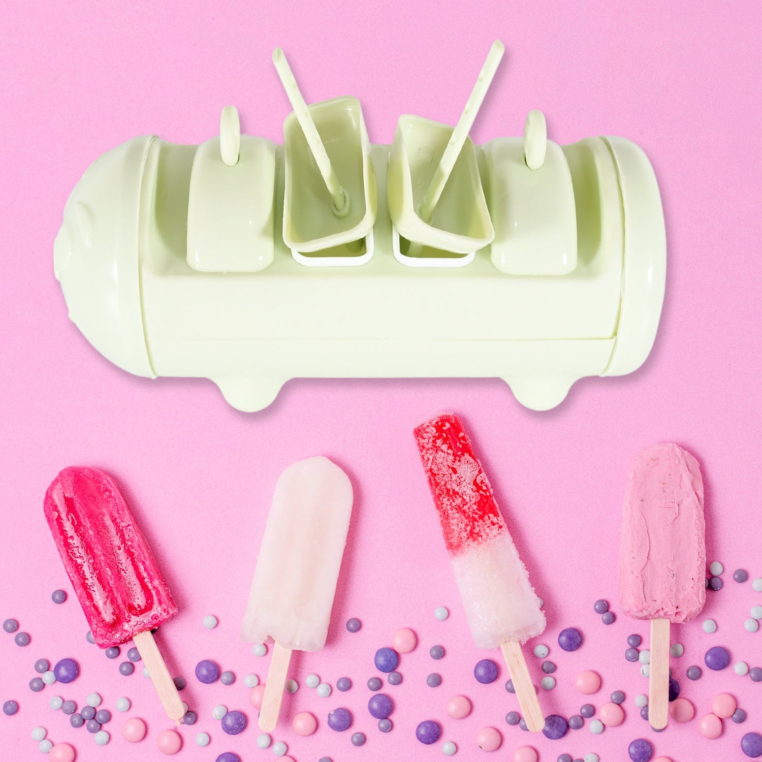 Multicolor Cartoon Ice Candy Mold with four fun-shaped popsicles, ready to enjoy.