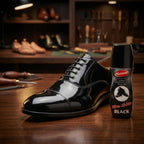 Application of black shoe polish using sponge applicator