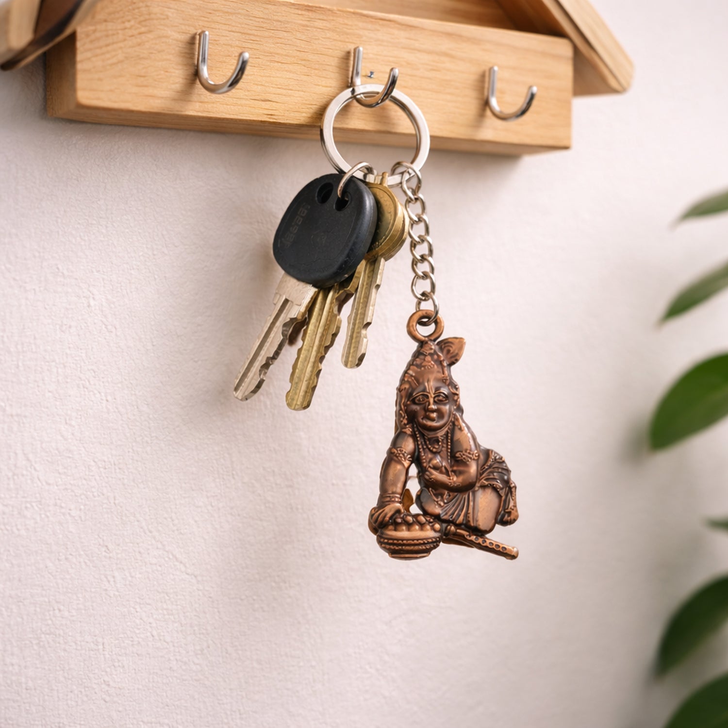 Back view of the Bal Krishna Makhan Chor antique gold keychain