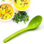 Plastic ladle scooping cooked rice from a bowl in a kitchen setting, showcasing its use.