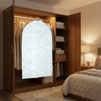 Hanging clothes inside zippered breathable garment cover