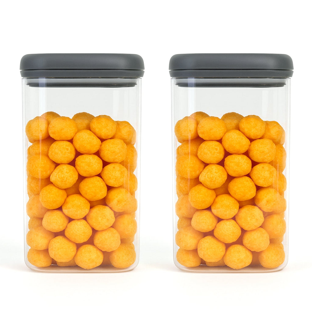 Slim cylindrical kitchen storage boxes with clear bodies and black lids