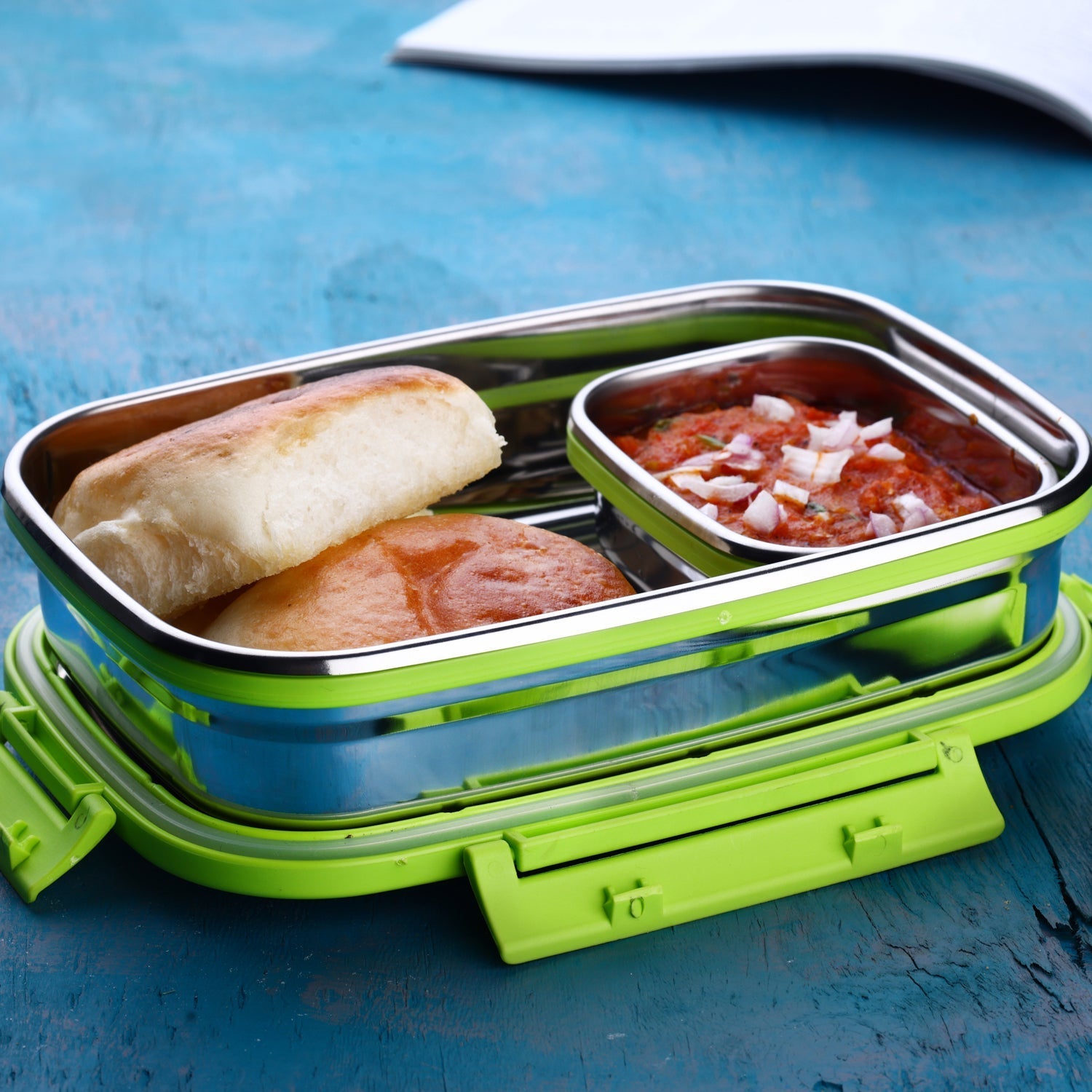 Portable stainless steel lunch pack with sturdy handle for easy carrying