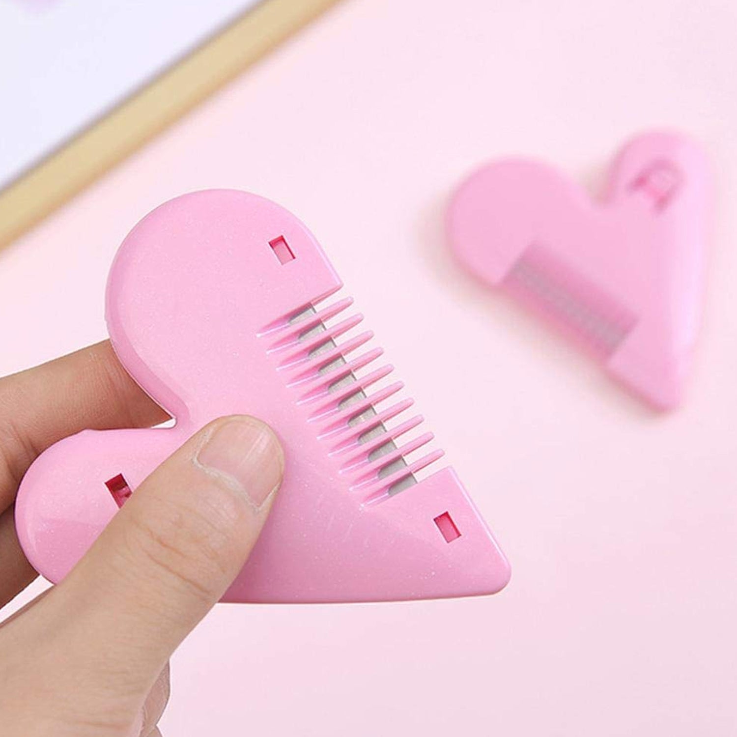 Compact heart-grip trimming scissors, travel-friendly