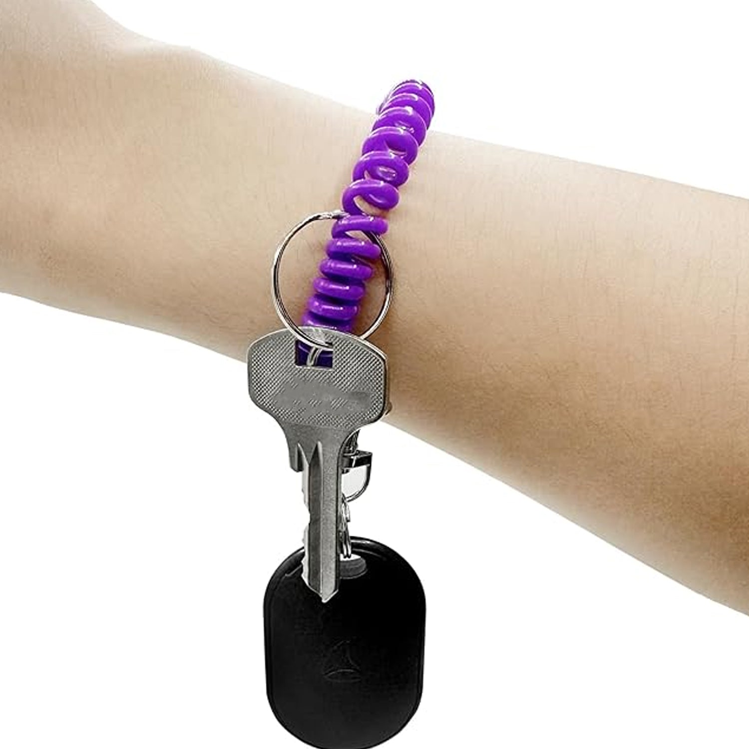 Detailed view of the spiral design of a telephone wire hair tie.