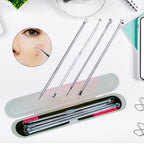 Close-up of double-ended stainless steel blackhead removal needles for precise extraction