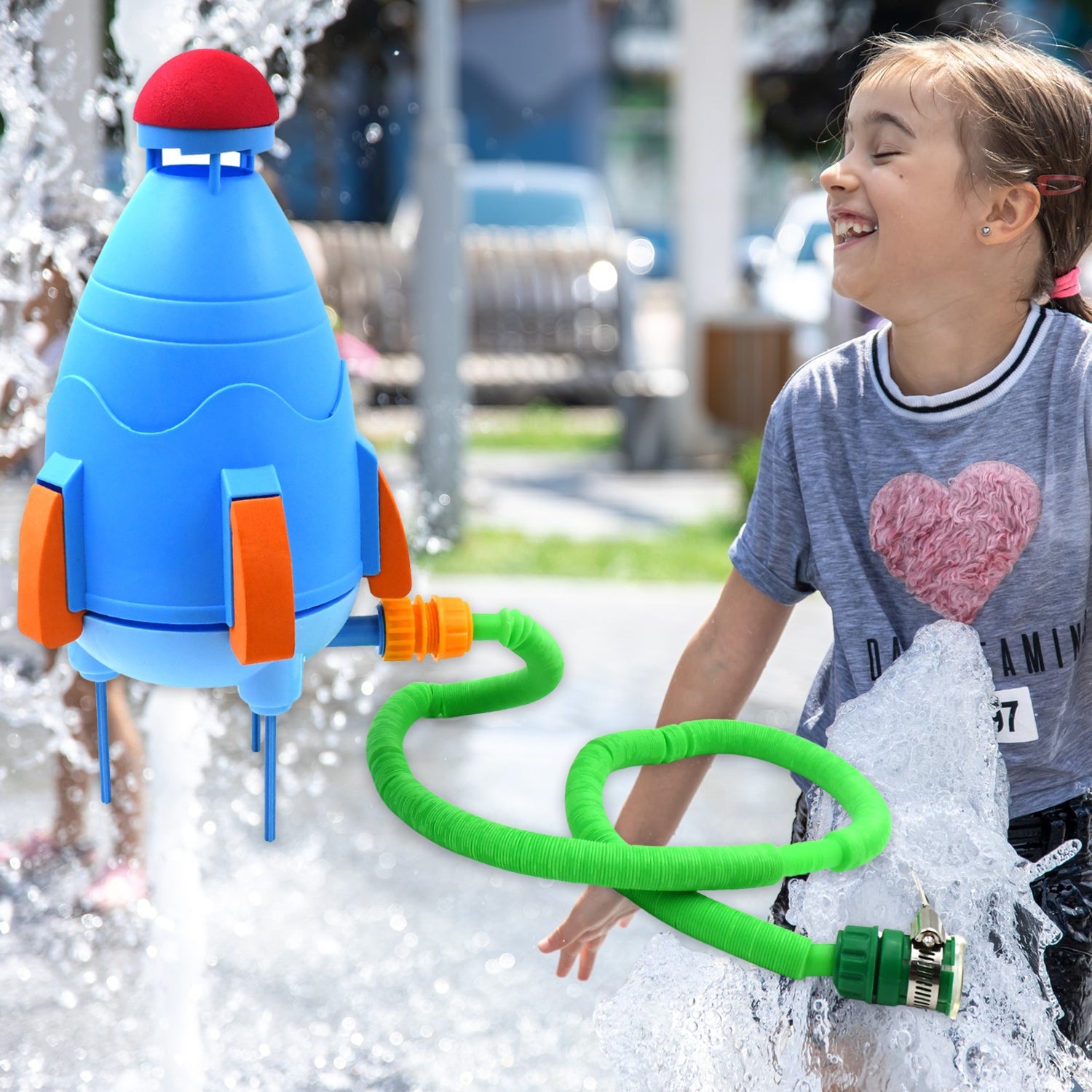 Close-up of the colorful rocket-shaped water sprinkler toy.