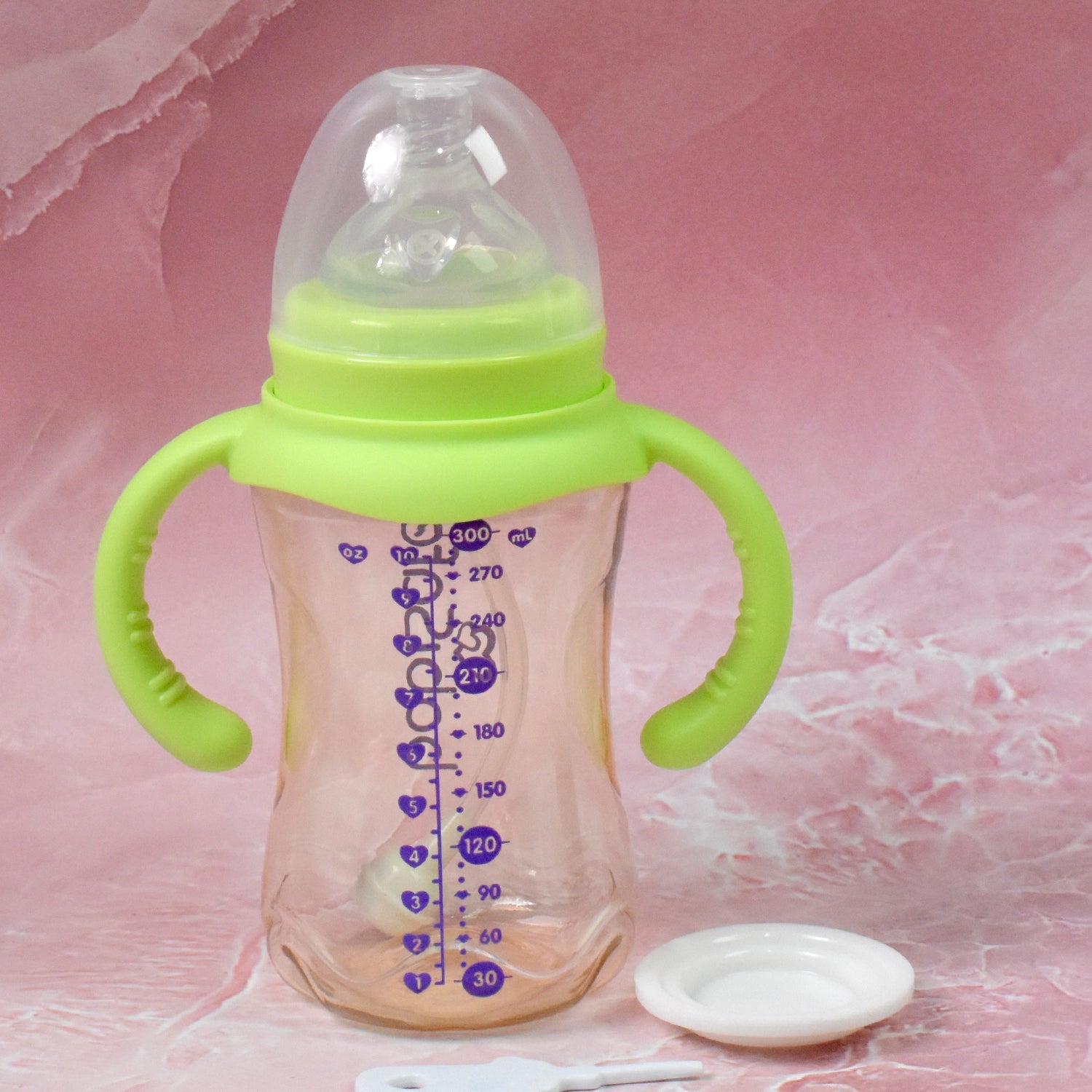 Side view of the Feedora baby bottle, showcasing its durable plastic construction and straw.