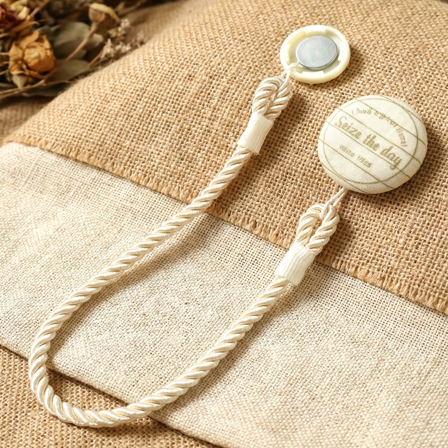 Decorative magnetic curtain accessory with twisted rope design