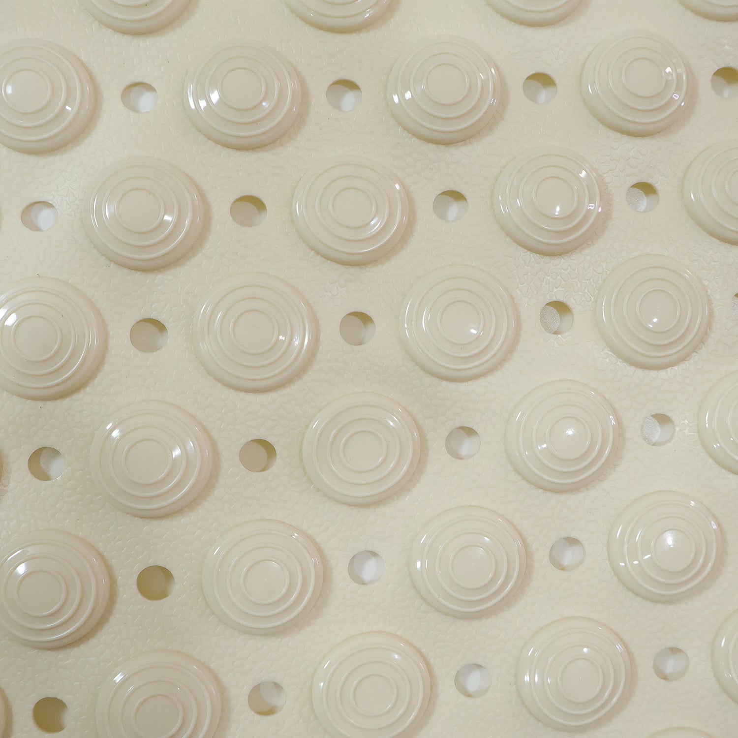Flexible anti-slip bath mat folded to show versatility and easy storage