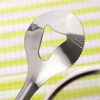 Angled view of the durable stainless steel frying filter spoon.
