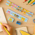Vibrant 5-piece wooden kids stationery set with cartoon designs.