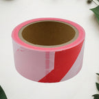Roll of non-adhesive safety tape ready for deployment.