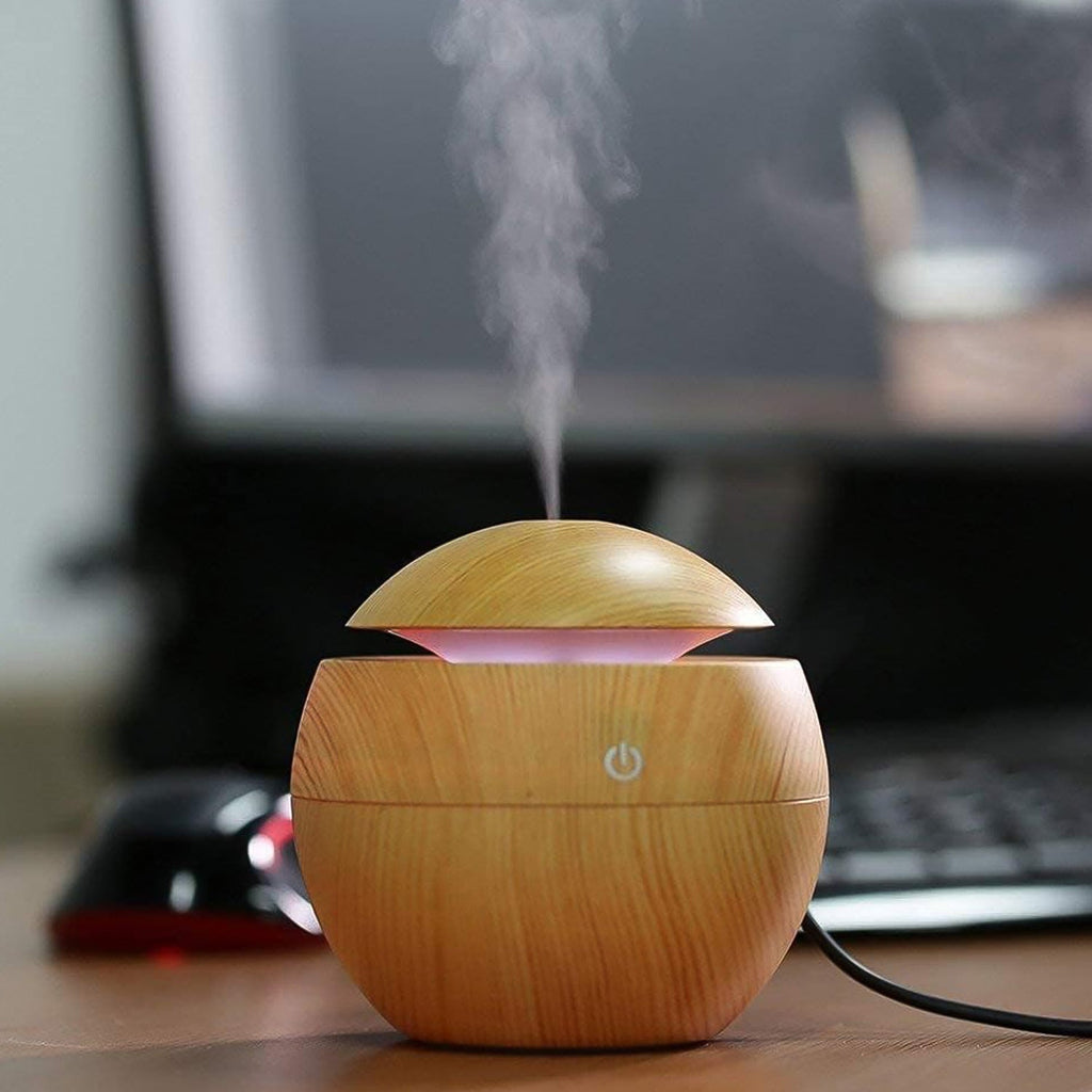 Side view of the USB desktop humidifier, showcasing its sleek design.